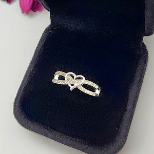 Infiniti heart, silver ring with inlaid rhinestone accents. New! Mult Sizes